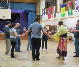 Don teaches a beginner's dance. contra3d-0513-09
