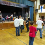 Dancing to the music.