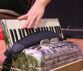 Amy fondles her accordion fondly. IMG_4048